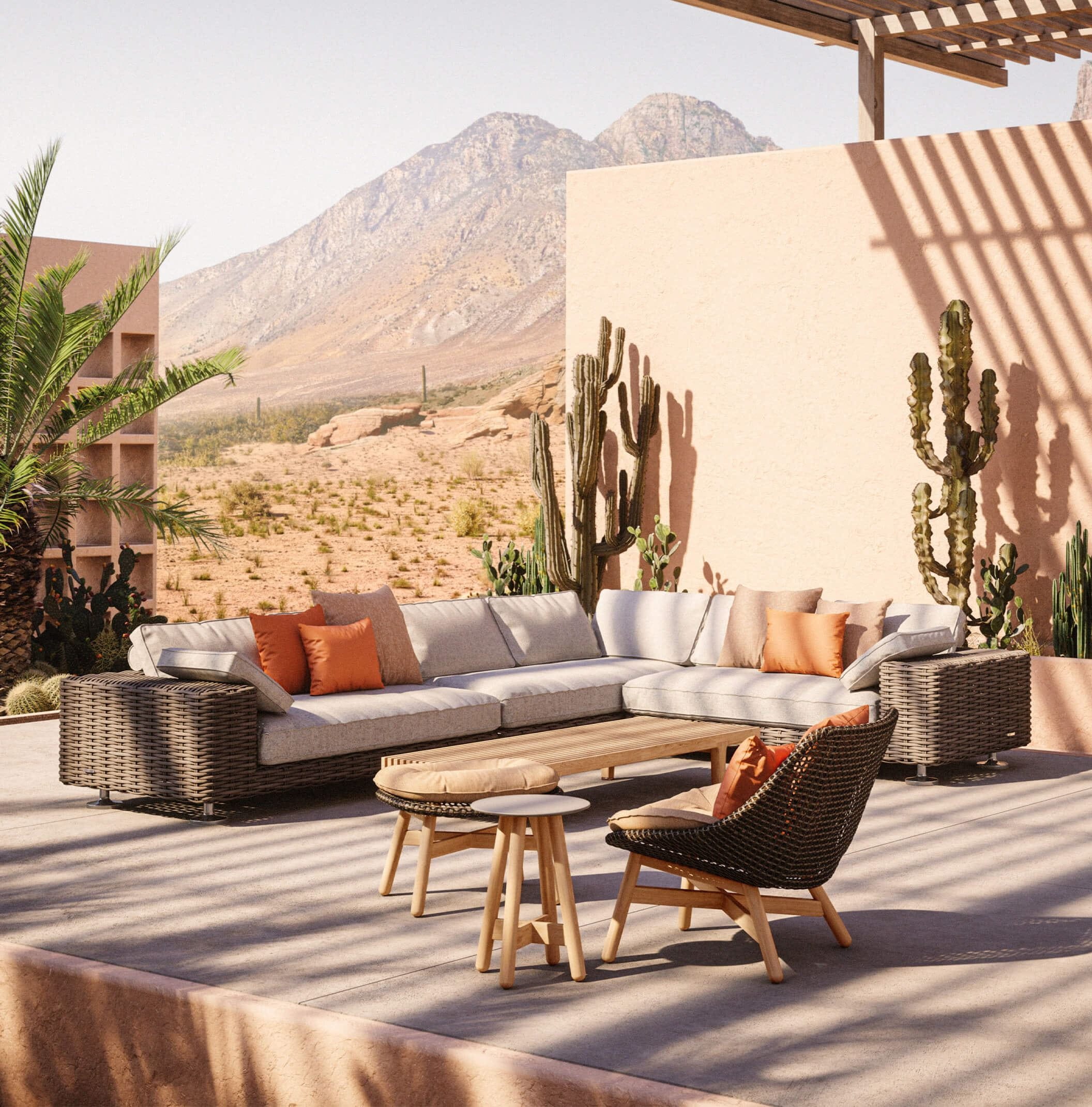 Dedon woven-fibre outdoor collection on a terrace, with the Mbrace lounge